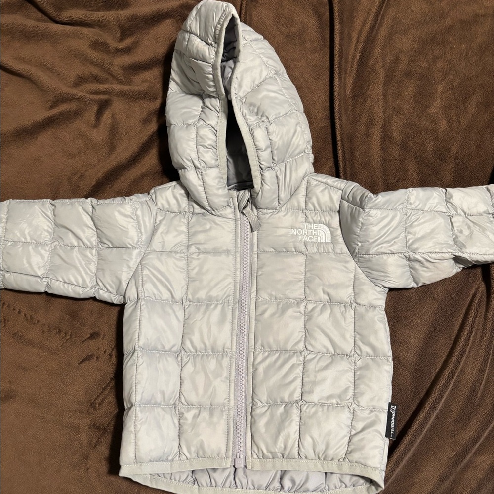 Like new. 3-6 month The North Face puffer